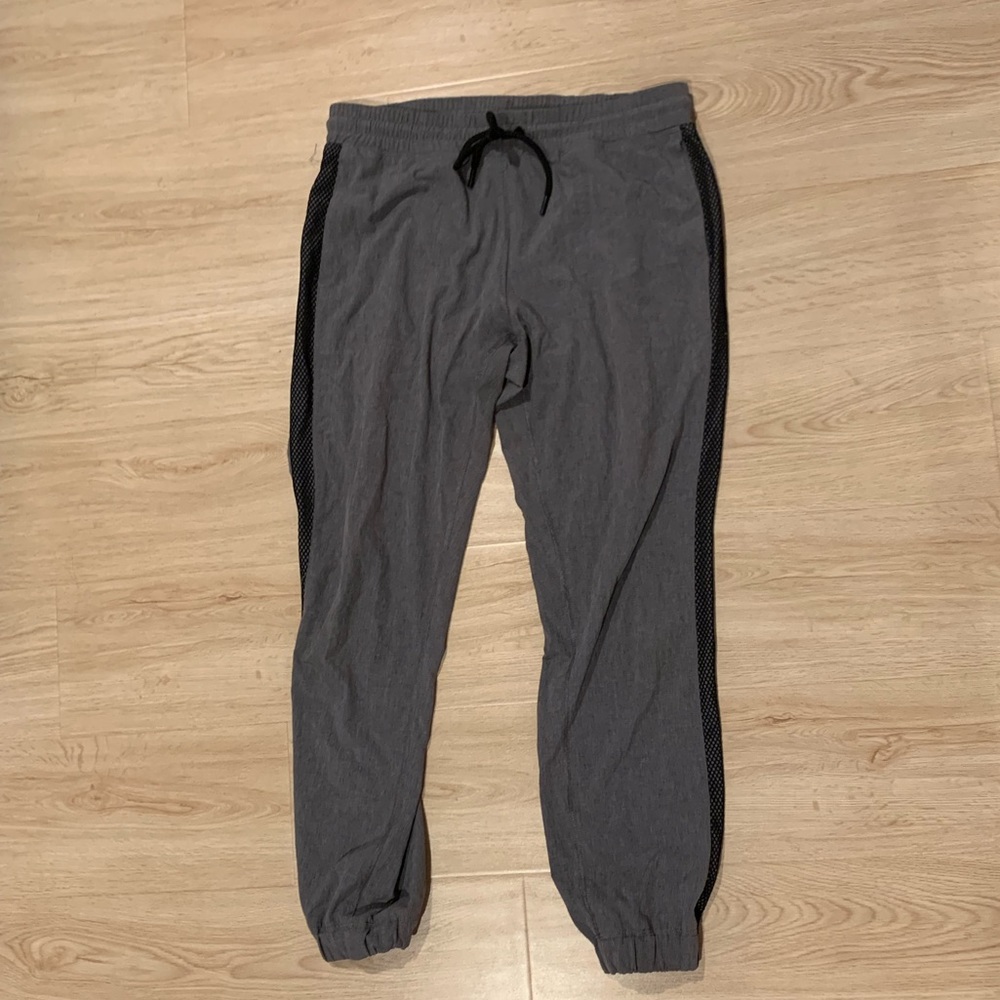 Grey track pants